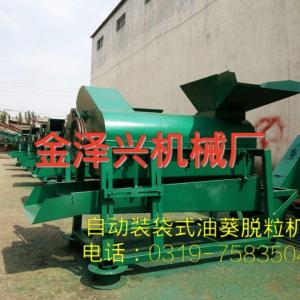 供應電機式自動袋裝式拖拉機式油葵脫粒機         。